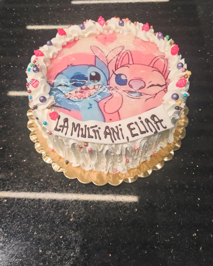 Tort cu Stitch și Angel, cu decor roz și albastru, pentru Elina